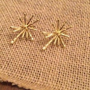 Gold tone star burst earrings